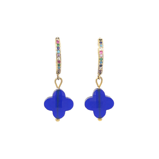 Gold hoop earrings with rainbow zirconia stones and clover-shaped glass charm in cobalt blue