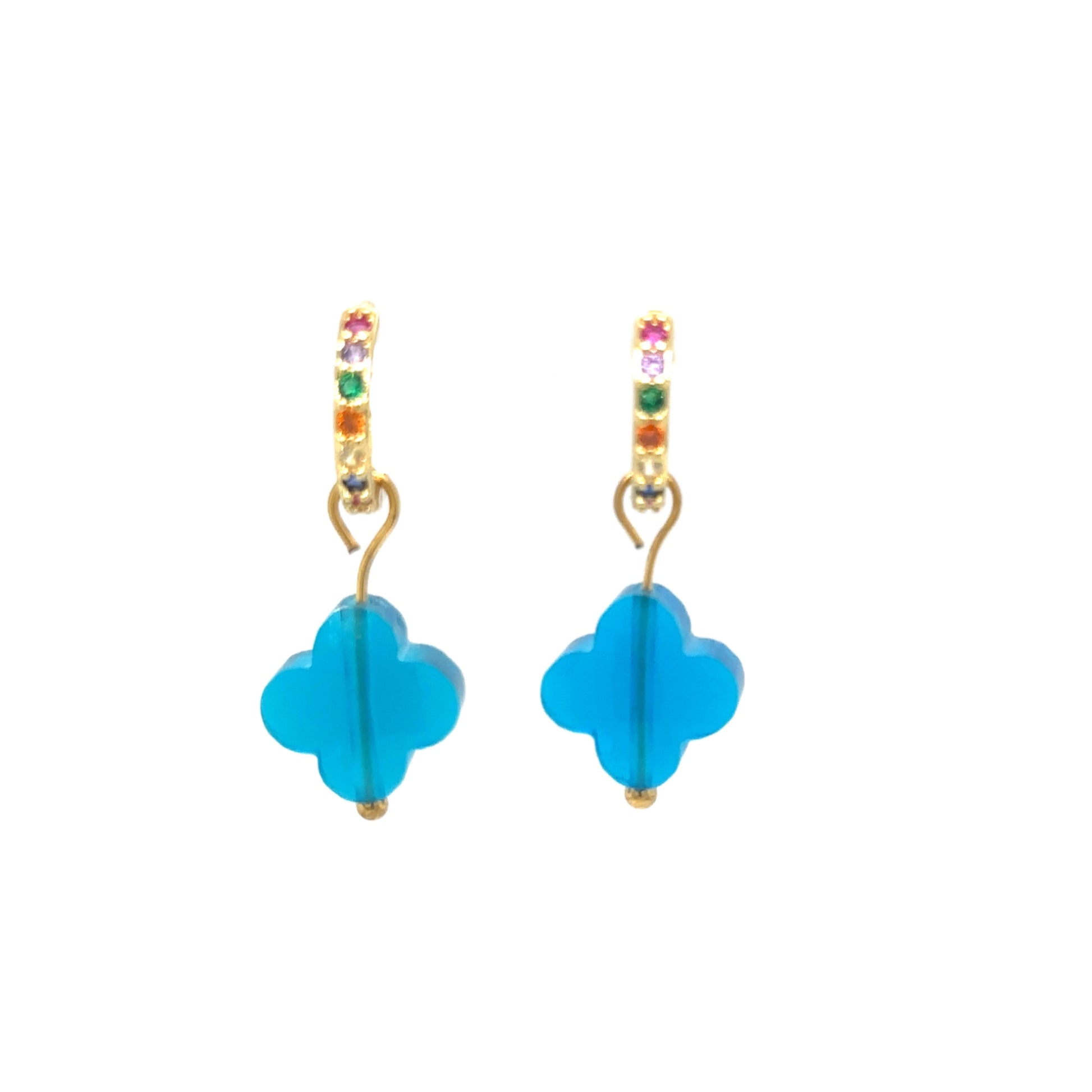 Huggie gold hoop earrings with rainbow zirconia stones and clover shaped charms in turquoise blue