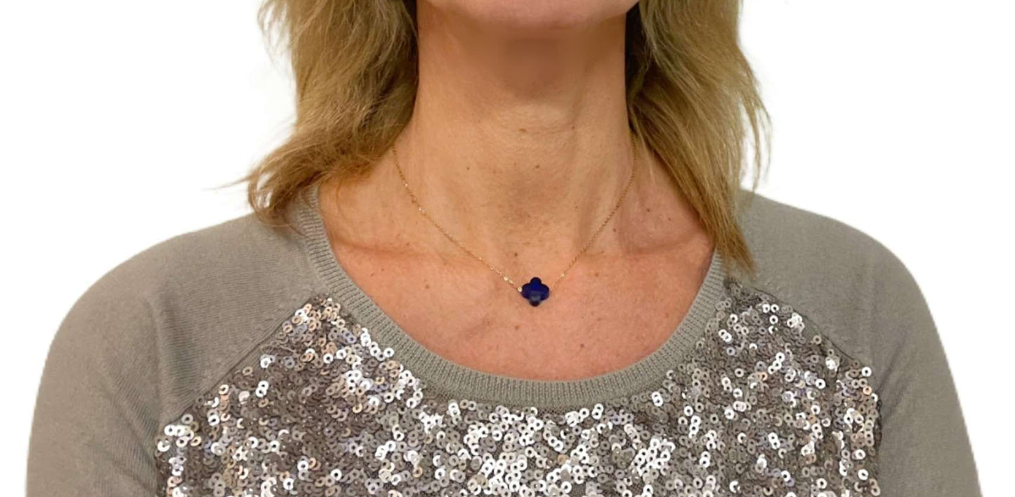 Delicate gold chain necklace with one clover faceted glass charm in Cobalt Blue